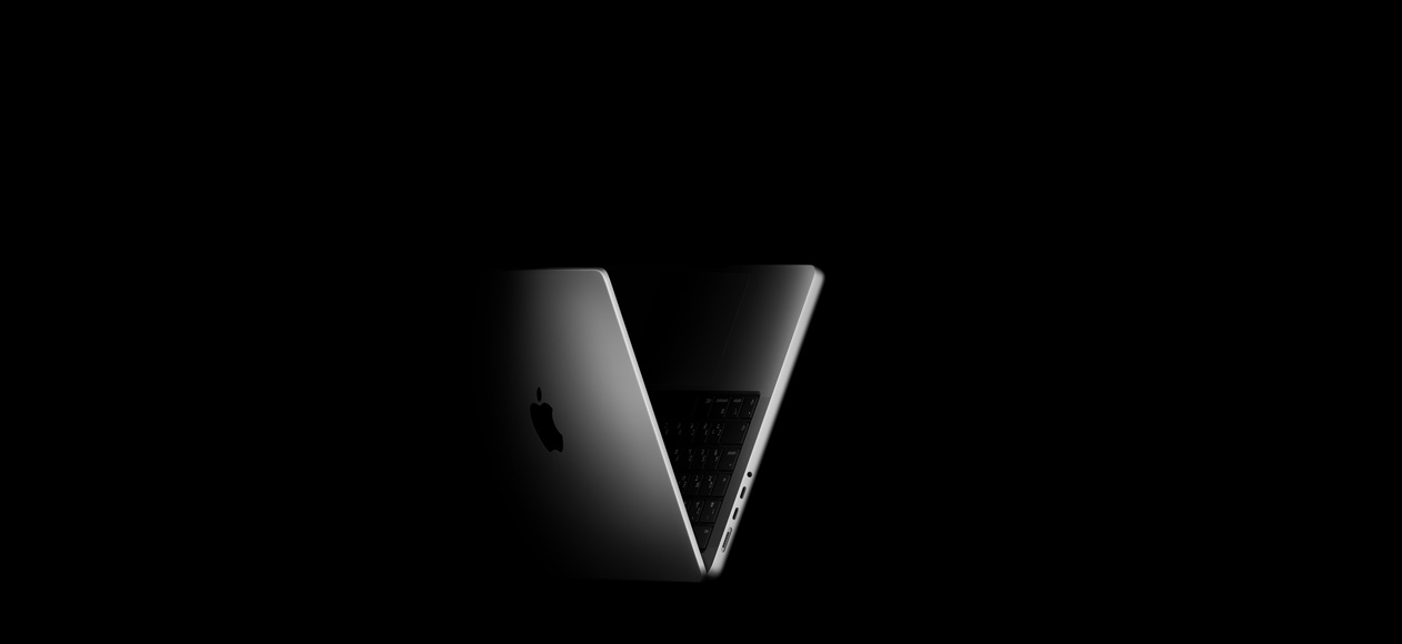 V字の形に配置されたMacBook Pro。M5チップファミリーを表現している